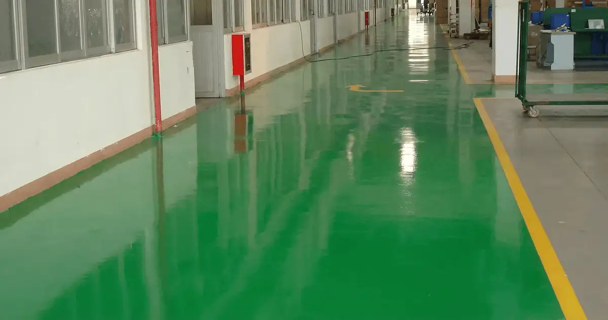 A factory floor professionally covered and marked with epoxy flooring in Mobile, AL
