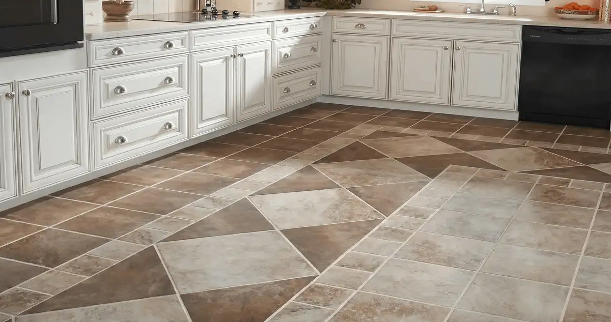 Kitchen with white cabinets and a professionally installed tile floor in Mobile, AL